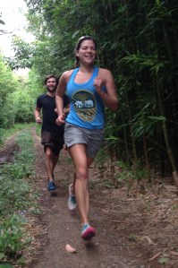 Dallas and I break into a run during a hike on the Manoa Falls trail