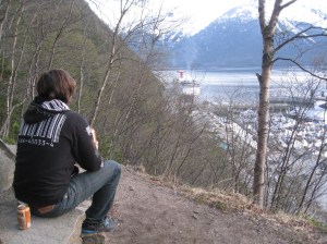 from a trail high above, Dallas watches the departure of a cruise ship